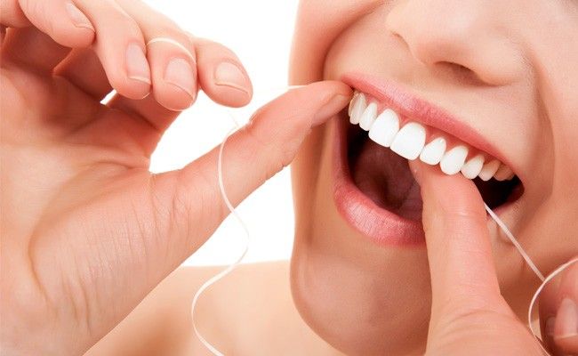 como usar fio dental corretamente Como usar o fio dental corretamente