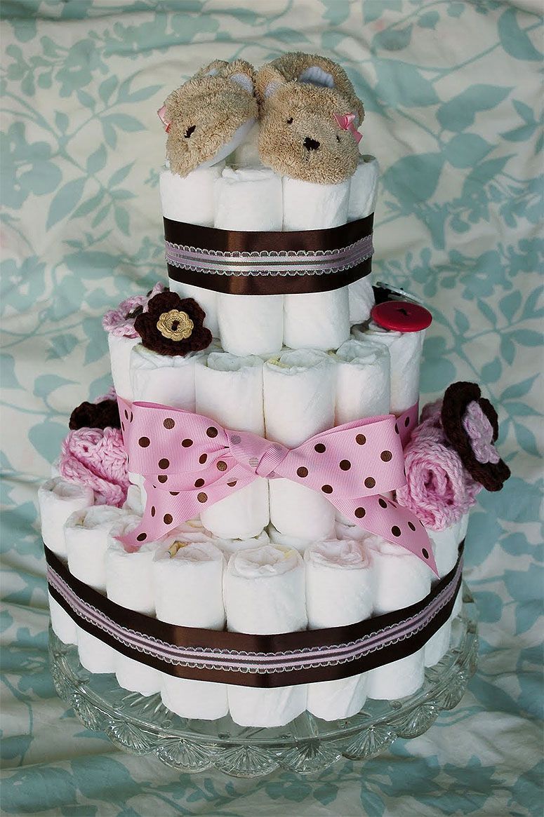 Foto: Reprodução / <a href="http://allicrafts.blogspot.com.br/2011/04/how-to-make-diaper-cake.html" target="_blank">Alli Crafts</a