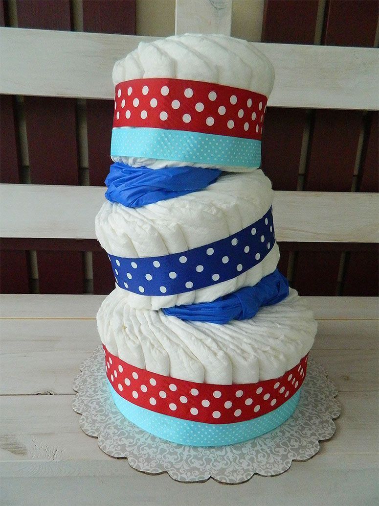 Foto: Reprodução / <a href="http://thedomesticfour.com/2013/05/14/diaper-cake-tutorial-plus-a-dr-seuss-baby-shower-update/" target="_blank">The Domestic Four</a>