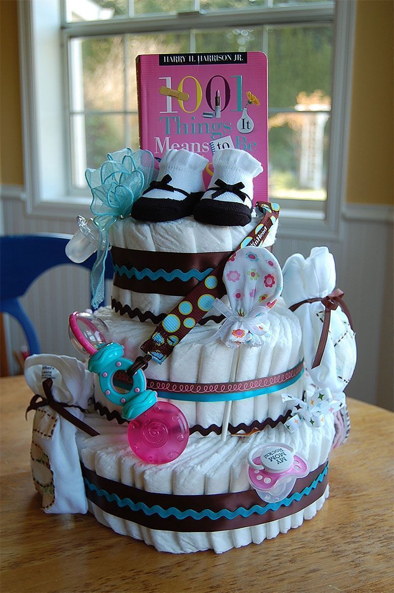 Foto: Reprodução / <a href="http://saltboxinthecountry.blogspot.com.br/2011/05/how-to-make-baby-diaper-cake.html" target="_blank">Saltbox Treasures</a>