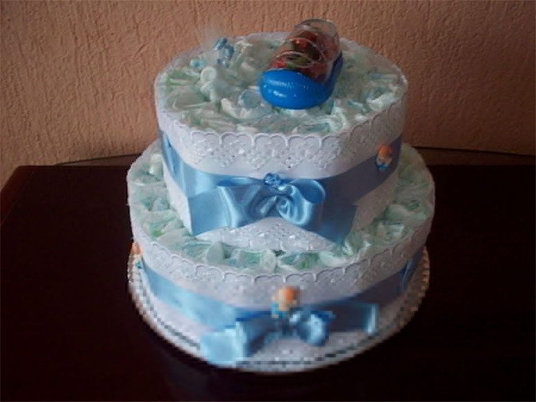 Foto: Reprodução / <a href="http://www.elo7.com.br/bolo-de-fraldas/dp/35AD47#hsn=0&df=d&uso=o&pso=cp&osbt=b-o" target="_blank">Elo7</a>