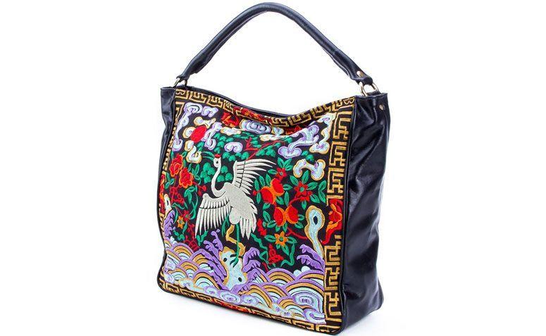 XAA leather embroidered bag by R $ 540.00 in Farfetch