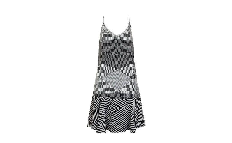 Vestido baby doll preto e branco com listras por R$90,99 na <a href="http://ad.zanox.com/ppc/?28065109C79450365&ULP=[[http://www.dafiti.com.br/Vestido-DAFITI-UNIQUE-Preto-1683456.html?utm_source=zanox&utm_medium=deeplink_generator&utm_campaign=deeplink_generator]]" target="_blank">Dafiti</a>