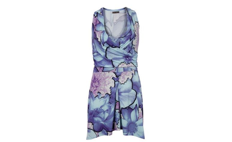 Vestido envelope com estampa floral lilás por R$239,90 na <a href="http://ad.zanox.com/ppc/?28065109C79450365&ULP=[[http://www.dafiti.com.br/Vestido-Petit-Transpasse-Floral-1135979.html?utm_source=zanox&utm_medium=deeplink_generator&utm_campaign=deeplink_generator]]" target="_blank">Dafiti</a>