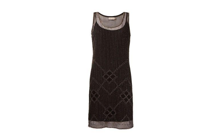 Vestido de tule bordado por R$699 na <a href="http://ad.zanox.com/ppc/?29469493C40749417&ULP=[[http://www.farfetch.com/br/shopping/women/cori-vestido-de-tule-bordado-item-10936505.aspx?utm_source=zanox&utm_medium=link&utm_campaign=deeplink_generator]]" target="_blank">Farfetch</a>