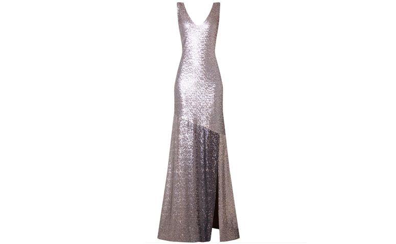 Vestido sereia prata metalizado por R$1.682,70 na <a href="http://www.capitollium.com.br/produto/VESTIDO-LONGO-PAETES-COM-DECOTE-NAS-COSTAS-SILVER-STAR-144284" target="_blank">Capitollium</a>