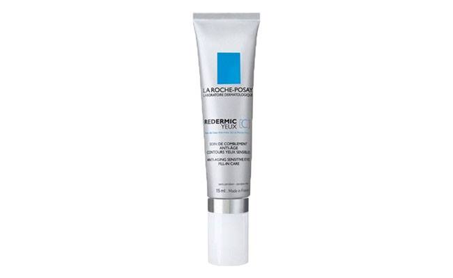 Redermic C da La Roche-Posay por R$65,40 na <a href="http://www.cosmetis.com.br/la-roche-posay-redermic-c-olhos-15-ml.html?___store=br&gclid=CN-4n6WnnrwCFRNp7Aod5mwA9w" target="_blank">Cosmetis</a>