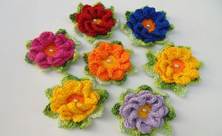 Flor de crochê colorida por R$6,00 no <a href="http://www.elo7.com.br/flor-de-croche-caracol-2/dp/5D1A36#df=d&fatc=1&uso=d&fvip=1" target="blank_">Elo7</a>