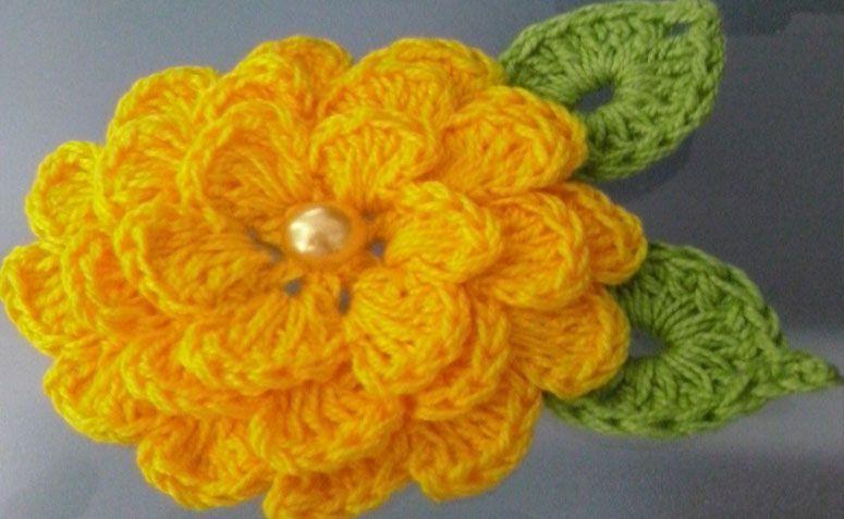 Flor de crochê com duas folhas por R$3,50 no <a href="http://www.elo7.com.br/flor-de-croche-para-aplique-com-2-folhas/dp/64FA19#pso=up&osbt=b-o&df=d&fatc=1&ss=0&sv=0&uso=o&fvip=1&hsn=0&smk=0" target="blank_">Elo7</a>