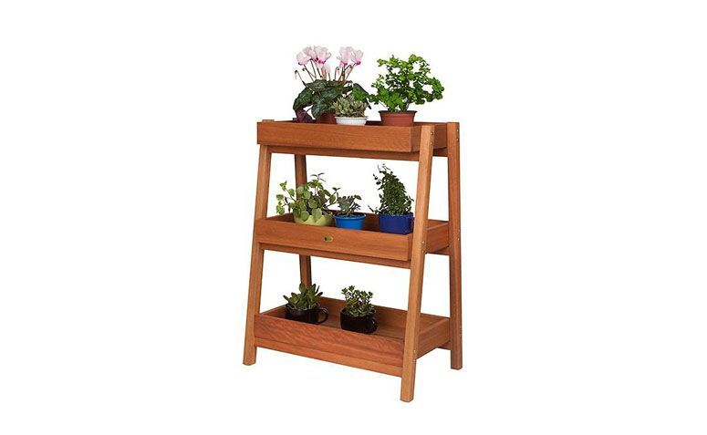 Estante 3 prateleiras Jatobá por R$809,00 na <a href="https://www.meumoveldemadeira.com.br/moveis/jardins-verticais/estante-3-prateleiras-holi-jatoba" target="blank_">Meu Móvel de Madeira</a>