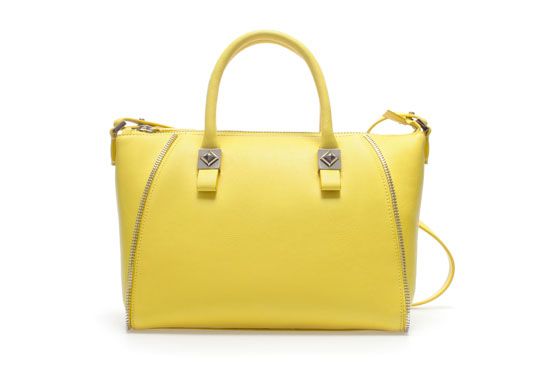 <p>Bolsa amarela - Zara por €35,90 na Loja Zara.</p>