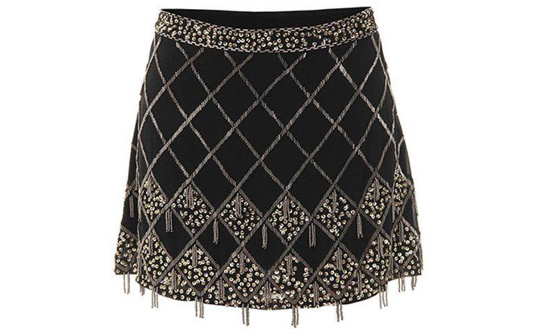 Saia Com Detalhes De Paetês Carol Muller por R$ 79,99 na <a href="http://www.passarela.com.br/passarela/produto/saia-com-detalhes-de-paetes-carol-muller-wr025-preto-6400680312-0" target="blank_">Passarela</a>