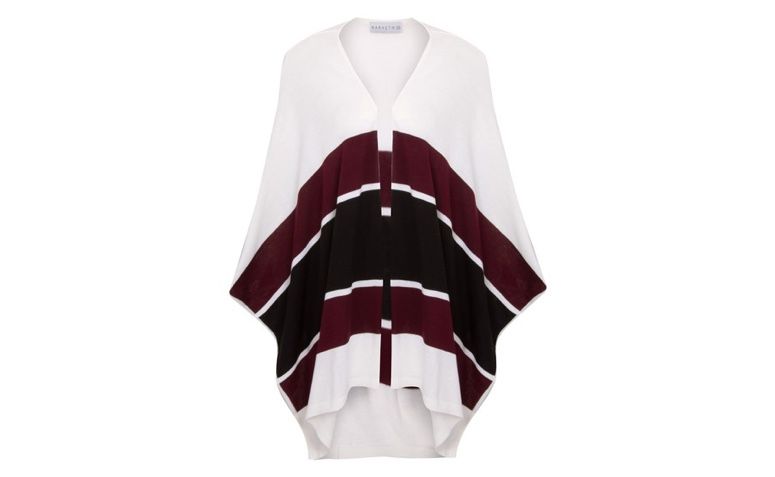 Poncho por R$70,00 na <a href="https://www.oqvestir.com.br/poncho-trico-trio-market-33-off-white.html
" target="blank_">OqVestir</a>