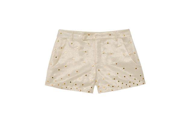 Short de lamê com tachas por R$110,00 na <a href="http://www.oqvestir.com.br/short-lame-tachas-18391.aspx/p" target="_blank"> Oqvestir</a>
