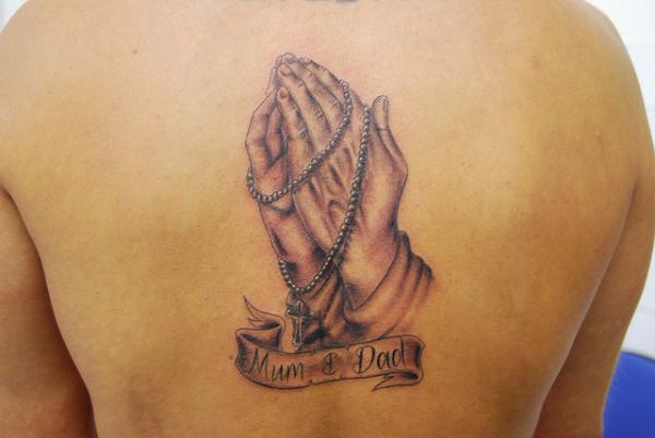 Foto: Reprodução / <a href="http://slodive.com/inspiration/rosary-tattoos/" target="_blank">Slodive</a>