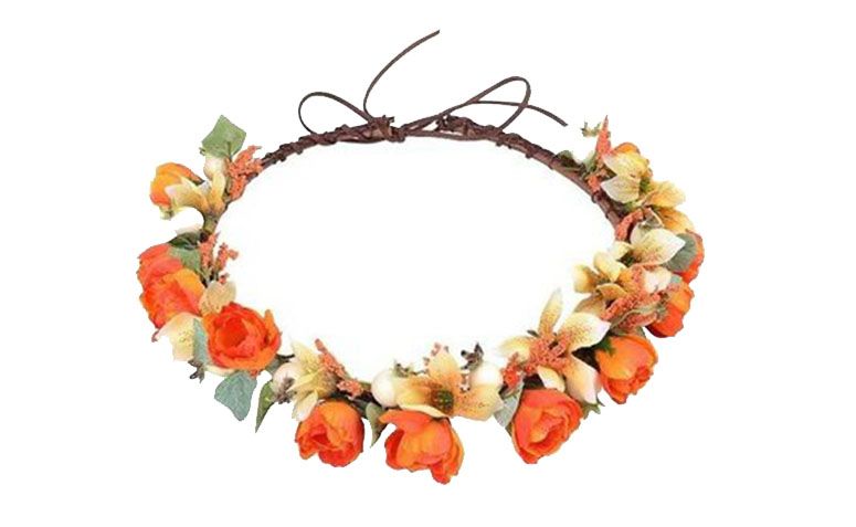 Tiara laranja e branca por R$49,90 no <a href="http://www.airu.com.br/produto/556232/coroa-de-flores-laranja-e-brancas" target="_blank">Airu</a>