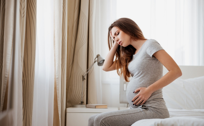 Cólica na gravidez: causas, sintomas e quando se preocupar