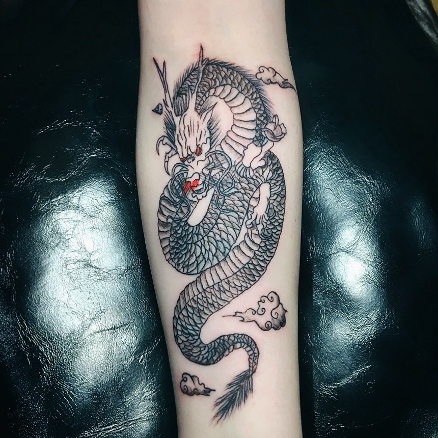Tatuagem de dragão: 95 fotos e os significados desse animal lendário