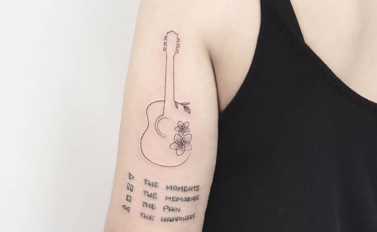 35 inspirações de tatuagem de violão para quem ama música