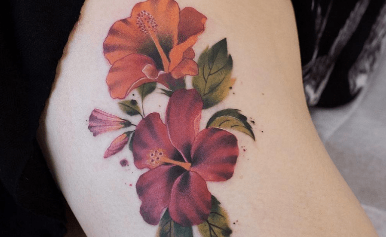 Tatuagem de flor na perna: 50 inspirações para sua próxima tattoo