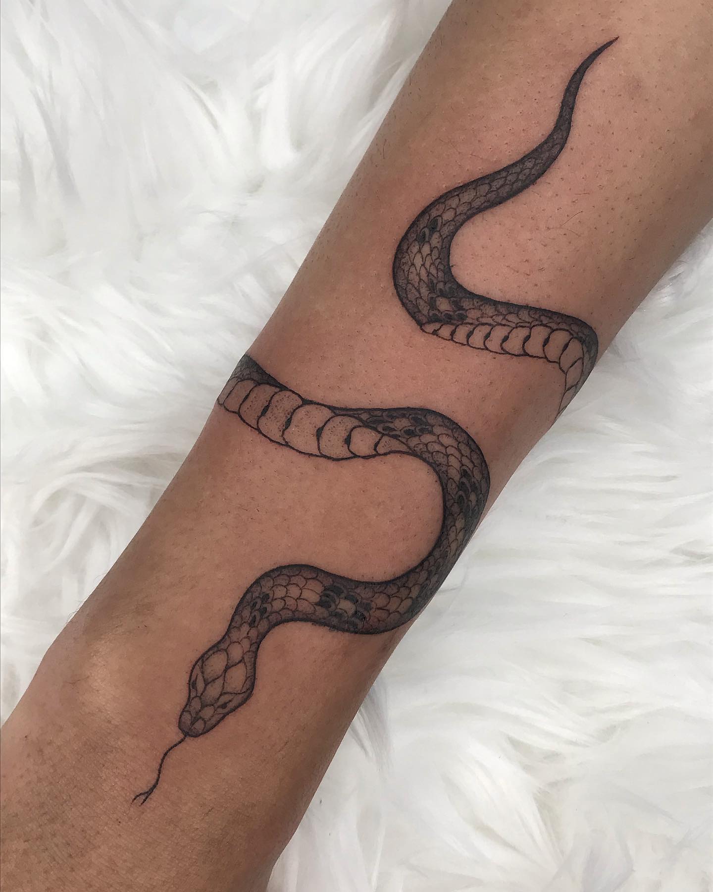 tataugem de cobra no braço
