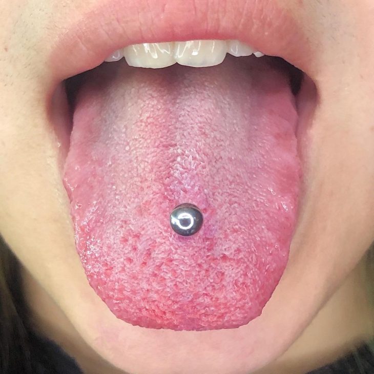 Middle tongue piercing