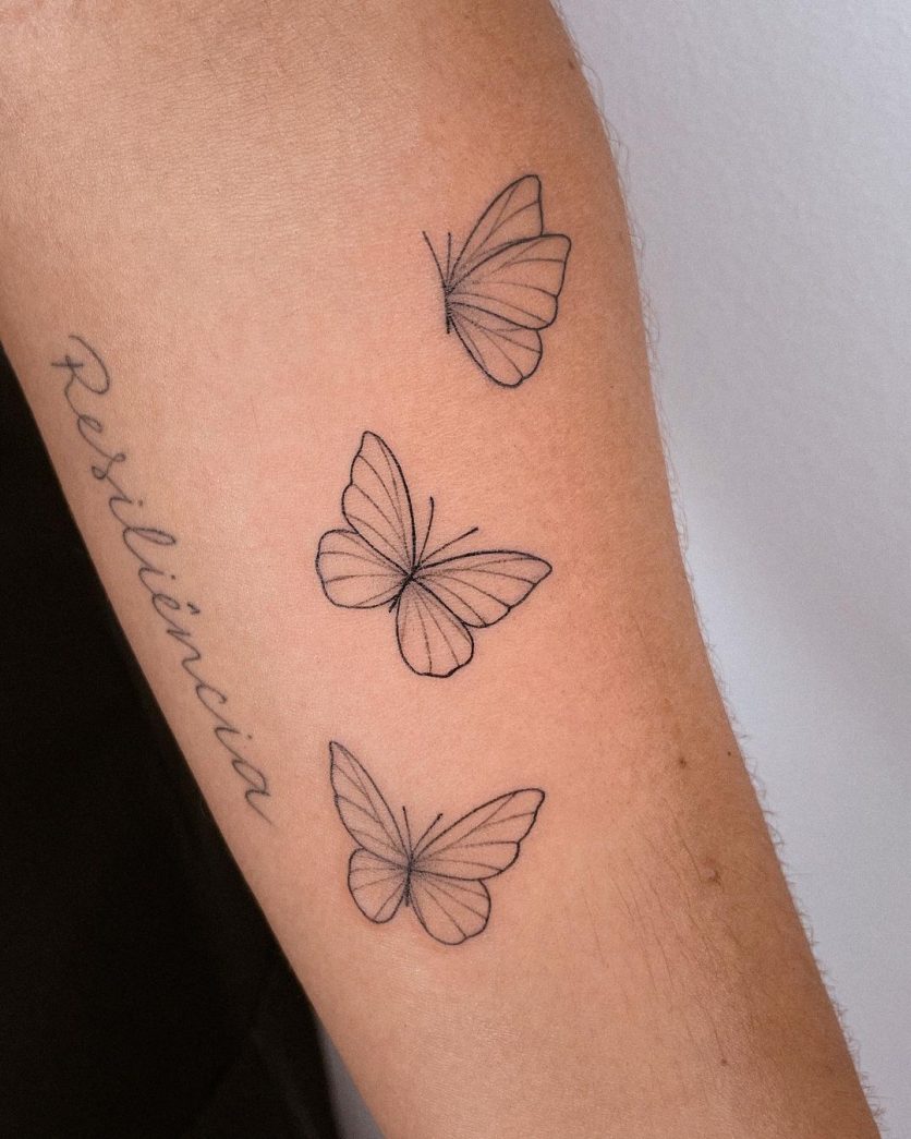 tatuagem de borboleta no braço com frase