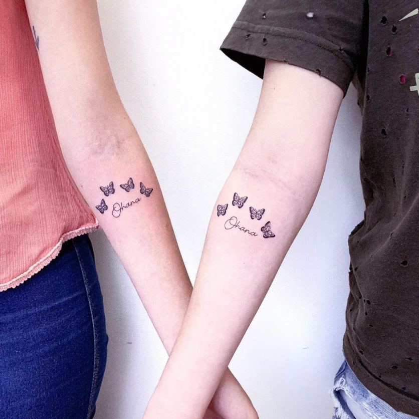 tatuagem de borboleta no braço com frase