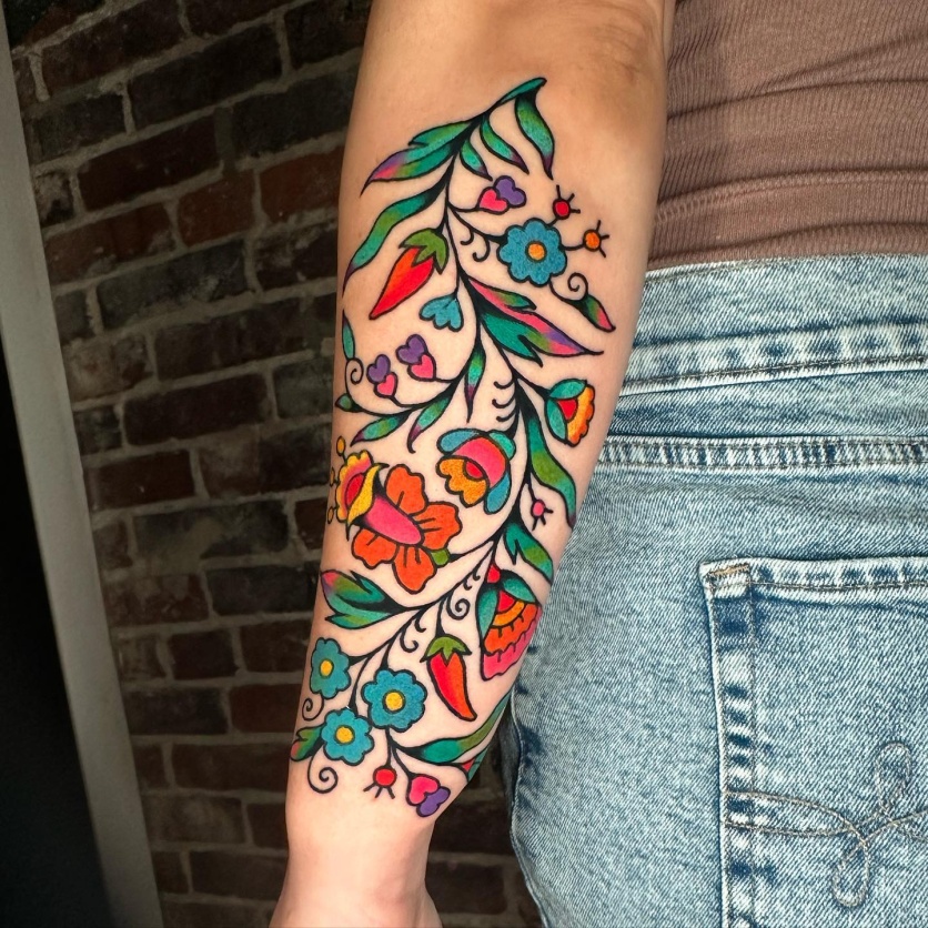 tatuagem de flores no braço